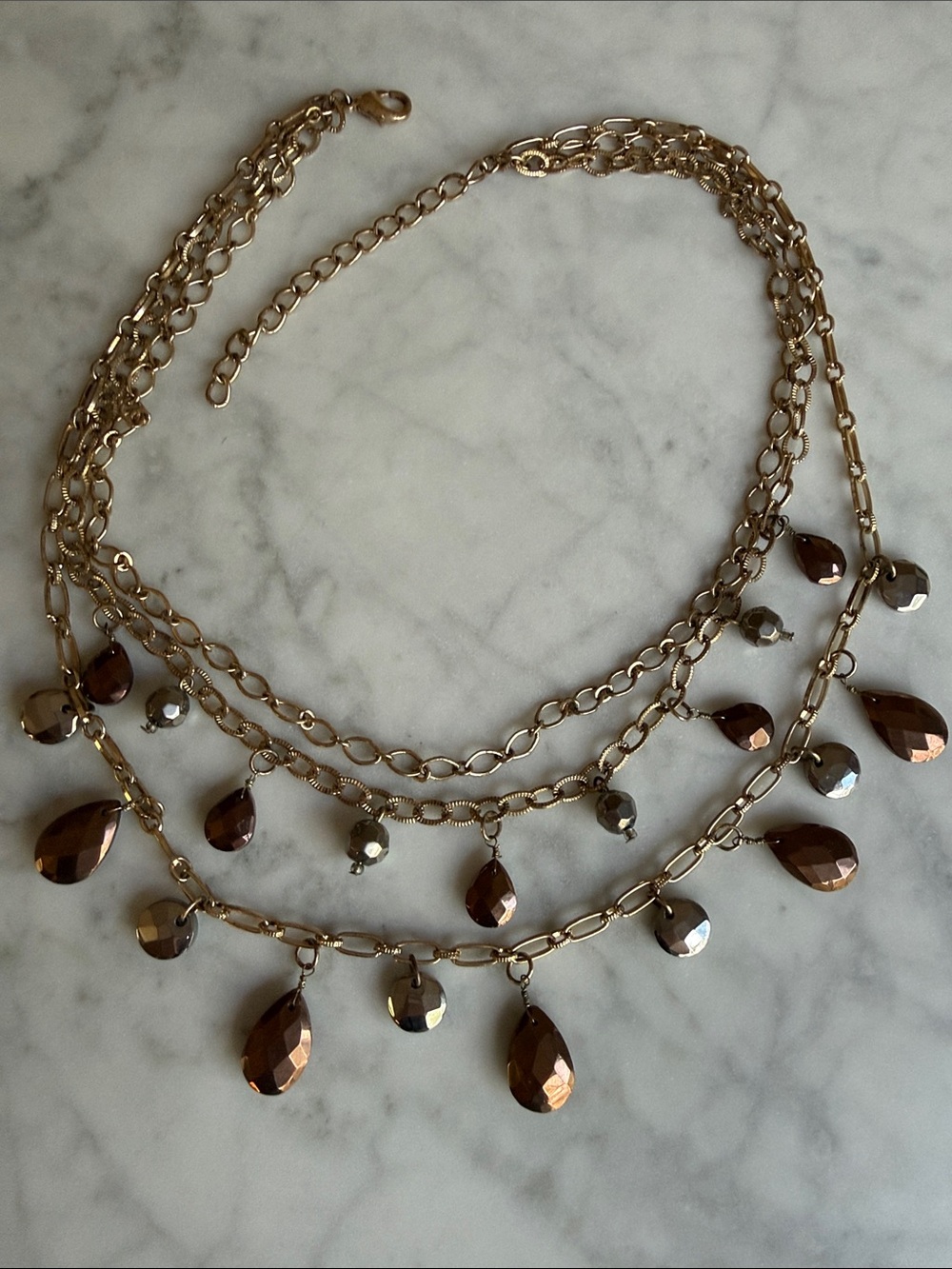 Gold-Tone Layered Necklace with Copper color Teardrop Faceted Silver-tone Beads